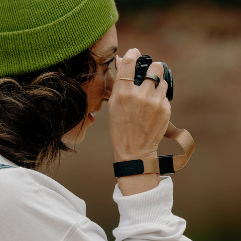 Anna wearing his coyote cuff with his camera
